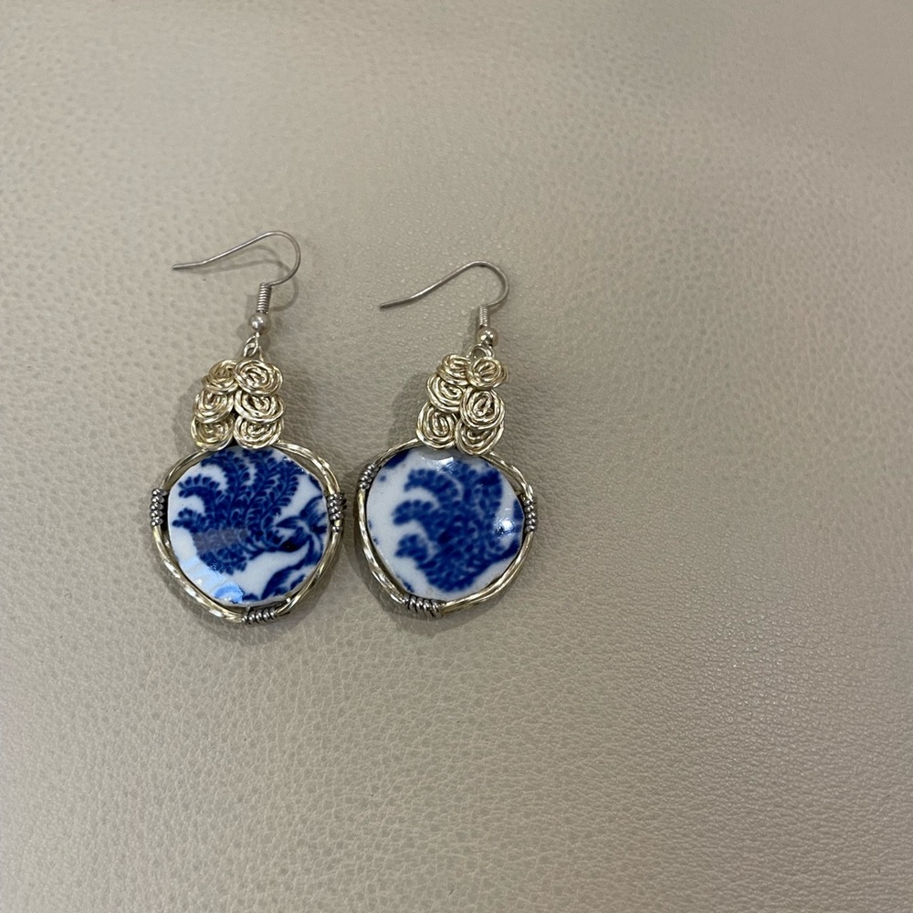China plates cut for designs and wire wrapped by hand